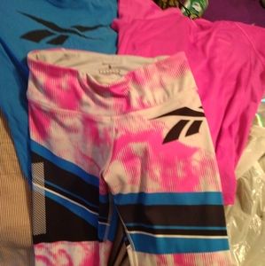 Leggings with 2 shirts that match. Sizes women's small